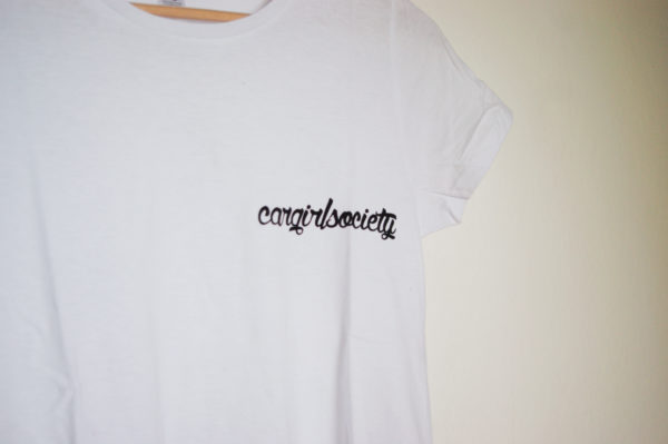 close up on cargirlsociety print on white t shirt